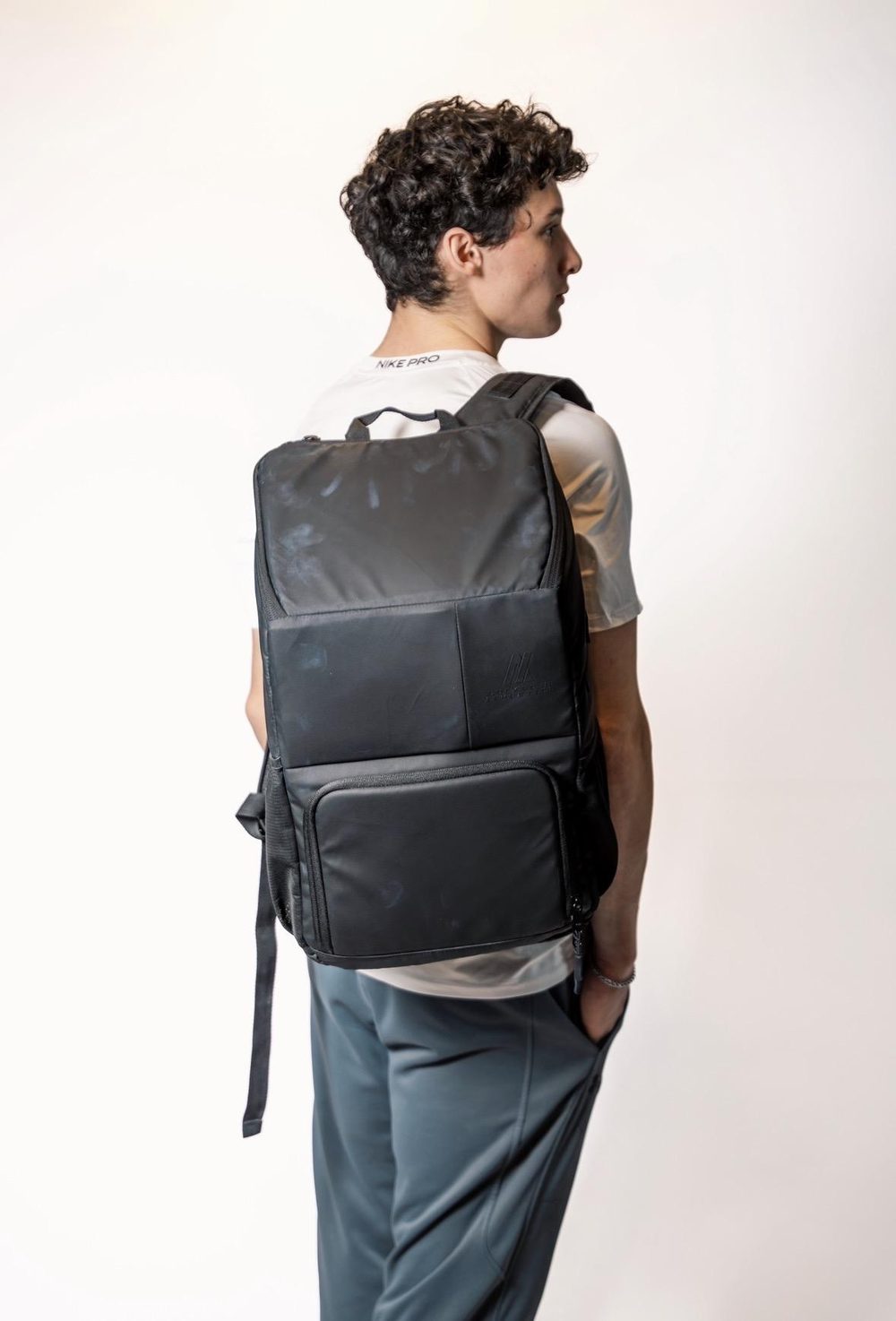 Athlete wearing a Locked In Athletics gymnastics backpack